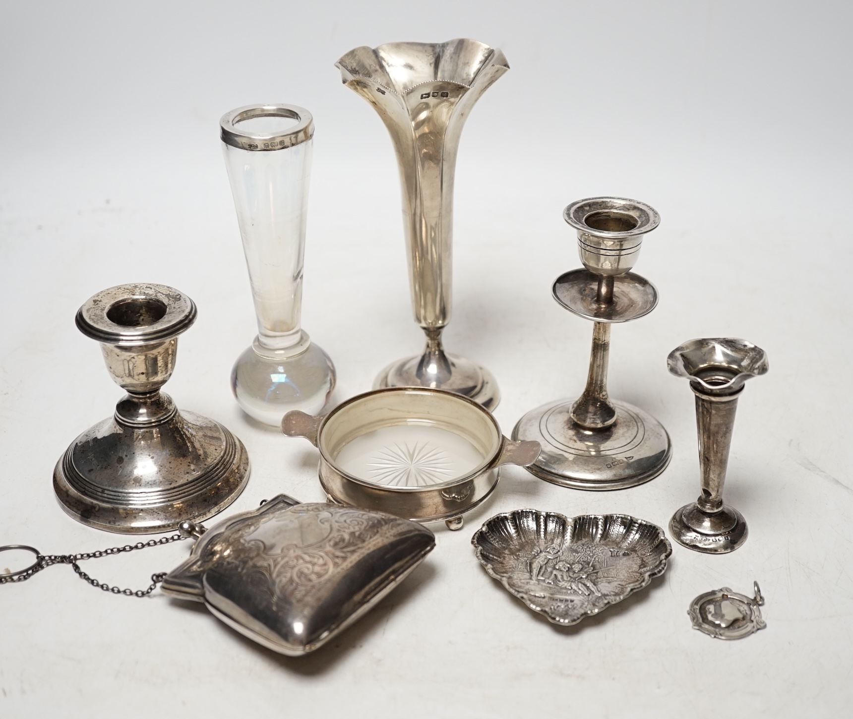 Sundry small silver including three spill vases, two dwarf candlesticks, two small dishes, a medallion and a purse. Condition - poor to fair